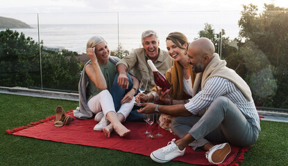 Mature people, picnic and champagne in outdoor garden for friendship, celebrate or travel party...