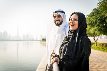 Arabic couple  wearing kandura and abaya dating in Dubai