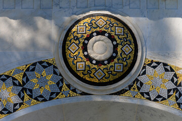 elements of architectural decorations of buildings, gypsum stucco, texture of the wall plaster and patterns, ornaments. In the city of Istanbul, public places.