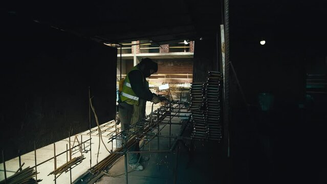 An electric welder connects metal fittings by manufacturing an iron structure