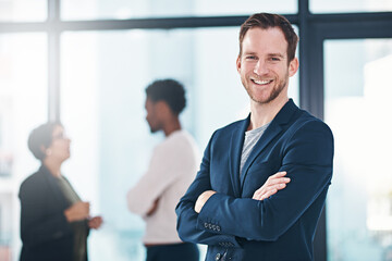 Confident, man and business with smile in portrait at office, manager or leader near team. Male...