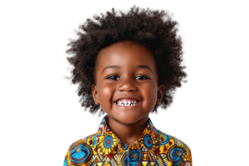 Studio portrait of young African-American little boy with Afro hair, bright colorful shirt and happy smile isolated on transparent png background.