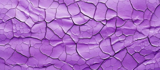Purple paint peeling from a wall