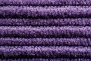 a close-up shot of a purple corduroy outfit