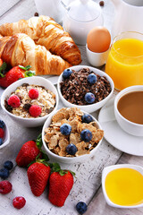 Breakfast served with coffee, juice, croissants and fruits - 790186947