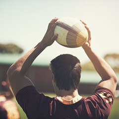 Athlete, game and rugby ball on field for training, workout and exercise in summer for fitness....