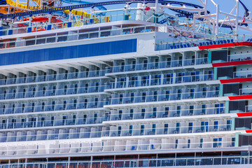 Close-up view of a сolorful multi-deck cruise liner. Curacao.