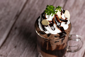 Chocolate ice cream in glass cup.Collection of different desserts.Gourmet summer dessert of...