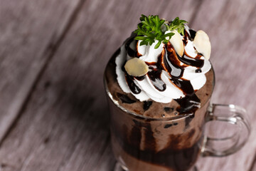 Chocolate ice cream in glass cup.Collection of different desserts.Gourmet summer dessert of artisanal or craft ice cream made.Cafe menu.