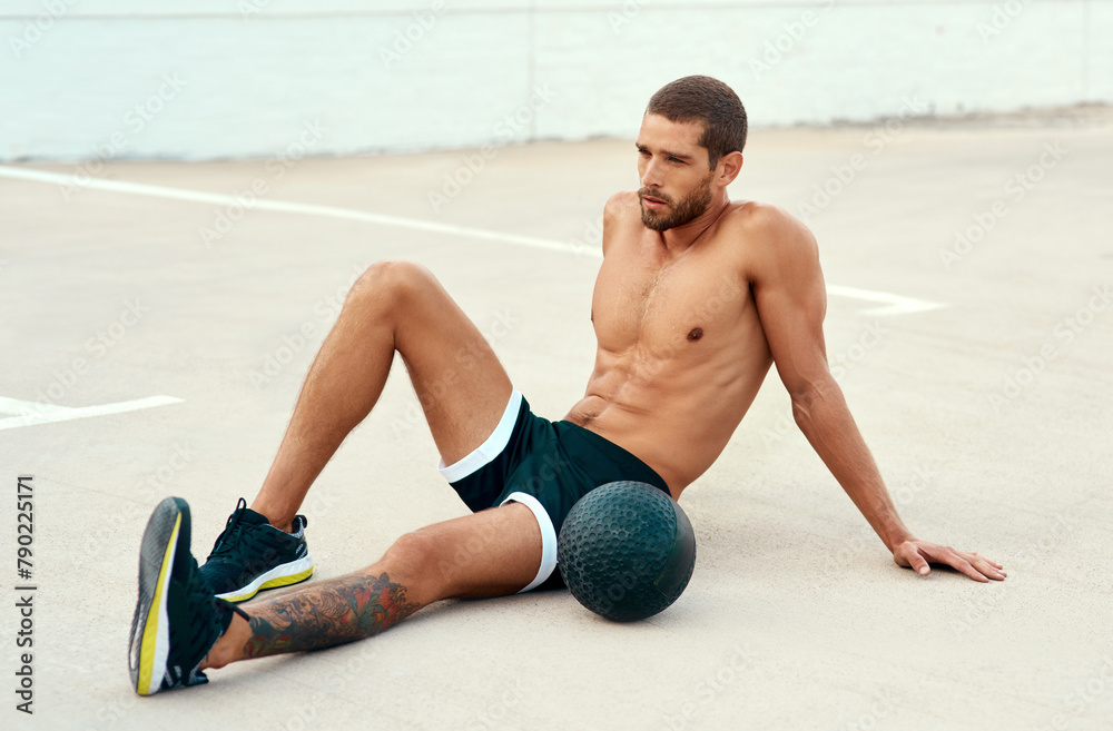 Poster Male athlete, rest and body with medicine ball for sports, exercise and fitness on break. Healthy, man and topless in workout, cardio and wellness for muscle, strong and training for mental wellbeing