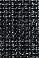 Fototapeta premium Linear black metal mesh, tightly spaced, seamless pattern, macro view, excellent for background textures