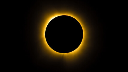 Color photo of a solar eclipse in totality with visible ring of fire and solar prominence. Copy...