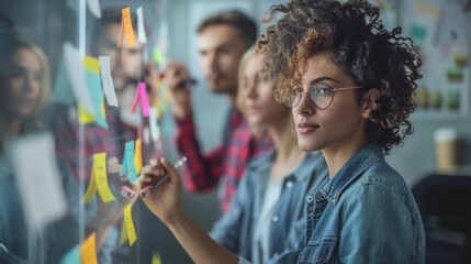 A diverse team brainstorming ideas in an Agile startup meeting