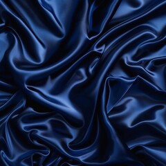 Fototapeta premium Billowing waves of indigo blue fabric have a rich, velvety texture that evokes a sense of luxury and opulence.