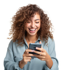 Beautiful girl with brown curly hair looking at the phone smiling on an isolated background
