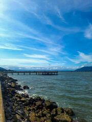 a pier on the Brazilian coast on a pleasant afternoon with blue skies