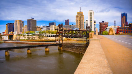 St. Paul City in Minnesota, skyline, skyscrapers, and St. Paul City Hall over the Robert Street Bridge and Mississippi River in the Upper Midwestern United States