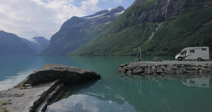 Family vacation travel RV, holiday trip in motorhome. Beautiful Nature Norway natural landscape.