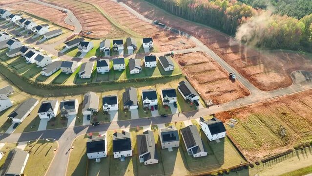 Construction site with new tightly packed homes in South Carolina. Family houses as example of real estate development in American suburbs