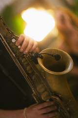 Captured in the midst of a concert, the essence of a saxophone's allure is framed in close-up - 790274516