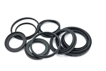 Detail of some camera lens thread adapter rings, they are step down rings and step up rings to...