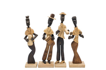 Detail of some decorative wooden dolls handmade in Cuba that represent black musicians playing...