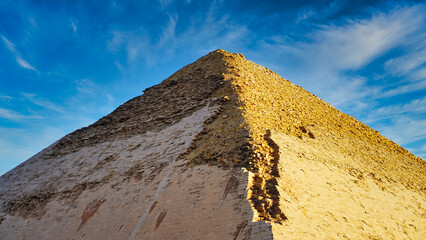 Close up of the walls of the Bent Pyramid highlighting the polished limestone blocks initally...