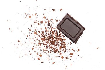 Pile chopped, milled dark chocolate isolated on white, top view	