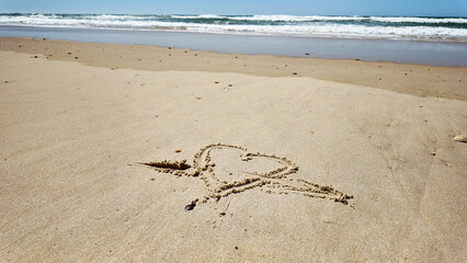 Un cœur sur le sable