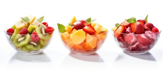 Set of bowls with tasty fruit salads.