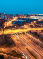 Fototapeta na wymiar Aerial night view of traffic light trial and railway, Beijing, China 