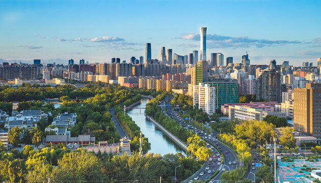 The Aerial view of sunset CBD of Guomao cityscape with traffic flow in Beijing, China