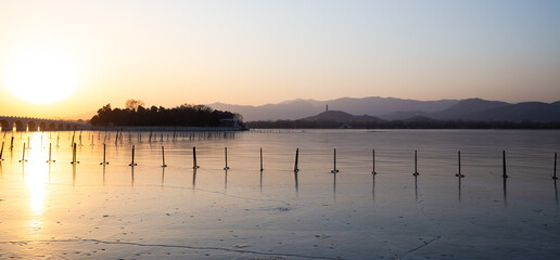 winter lake sunset scene in the Summer Palace, Beijing, China