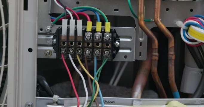 Air conditioner technician hand check condenser circuit by amp clamp meter,Air conditioner maintenance service, Home service concept