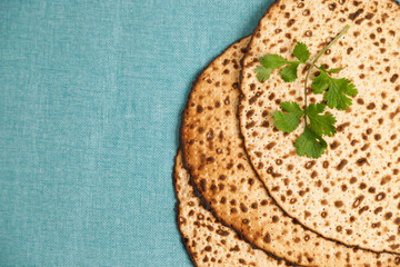 Matzah on blue background. Pesach celebration concept (jewish Passover holiday)