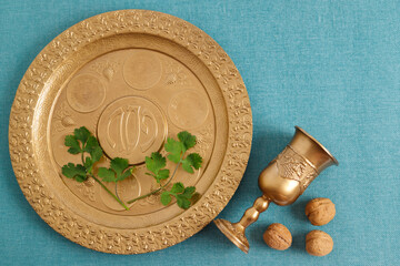 Golden plate for Seder Pesach (Jewish Passover holiday) (with the inscriptions: egg, shankbone,...