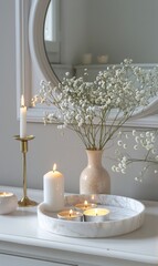 White Table With Vase, Flowers, and Candles