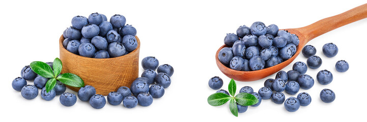 fresh ripe blueberry in wooden bowl isolated on white background