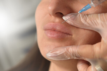 Lip augmentation injection for young women