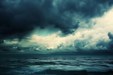 A photograph capturing a menacing and turbulent stormy sky looming over a vast expanse of water,...