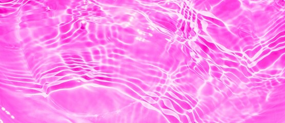 clean pink water background, calm waves with ripples for transparent summer banner. abstract background of pink