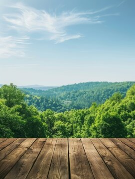 Extended wooden deck with a clear blue sky view - Capturing the essence of serenity, this image showcases an expansive wooden deck overlooking a lush forest canopy under a clear blue sky