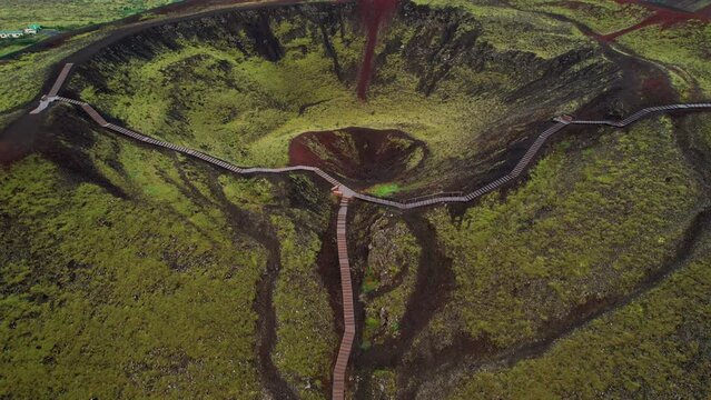 Epic Aerial Grabrok Crater Volcano. From Close Up Stair Walkway Drone Far Back to Ultra Wide Landscape. 4K High Quality Color Corrected.