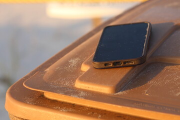 iphone smart phone outside in sunset mobile device stock photo