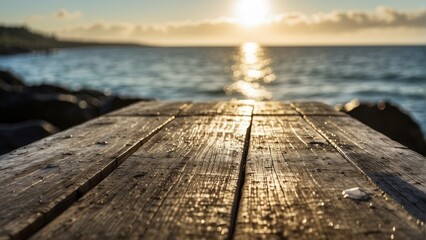 Sunrise over a calm sea viewed from a wooden pier - Powered by Adobe