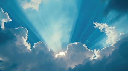 Sunrays beaming through clouds in sky - Dramatic sun rays bursting through clouds, illuminating the sky with a breathtaking display of light and shadow - obrazy, fototapety, plakaty