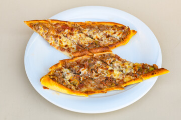 Kiymali pide. Turkish pide with minced meat. Turkish pizza mince pita Pide on white background. Etli ekmek. Kusbasi kasarli, kiymali kasarli, kiymali yumurtali, Bafra, Trabzon, Kusbasili pide.