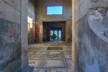 Interior view of ancient roman building Casa di Fabius Amandio at the ruins of Pompeii, Campania, Italy
