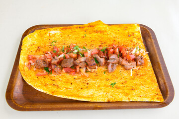 Beef steak grill with rice pilaf, fried potatoes, grilled pepper and tomatoes.Mix Platter with Beef rips, Cutlets, Potatoes and Sauces.