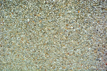 An old concrete slab with small pebbles